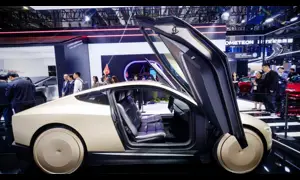 Tesla and global carmakers race against Chinese EV rivals at expo