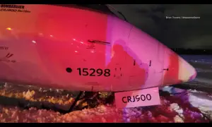 Plane skids off icy runway as snow snarls post-Thanksgiving travel