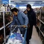 China industrial production grows at slowest pace in a year