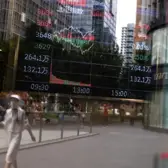 Hong Kong stocks slip from 4-year high amid fears of US sanctions on drug makers