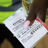 Sunblock, charcoal ... and Powerball? Holiday weekend lottery drawing worth $1 billion